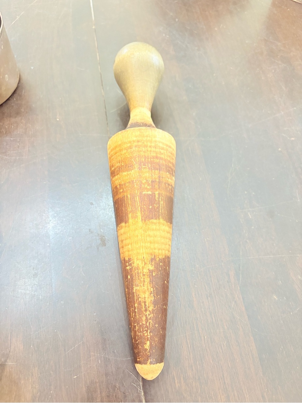 vintage wooden cone-shaped pestle or masher